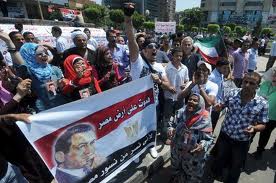 ابناء مبارك يتظاهرون خارج أكاديمية الشرطة